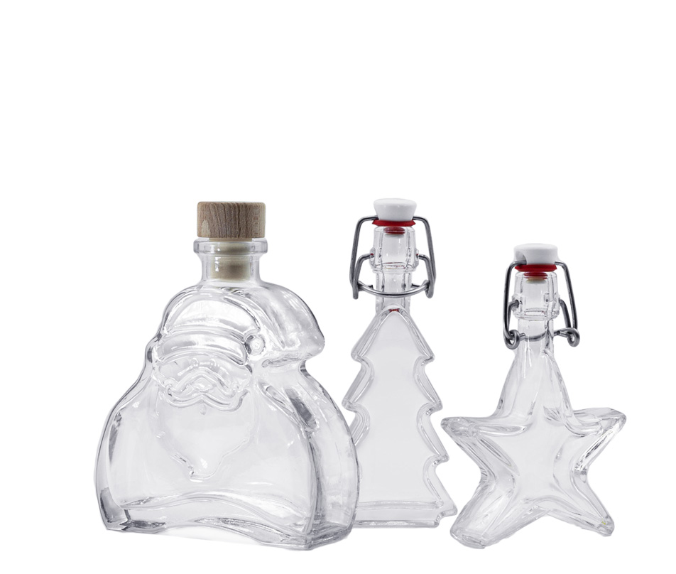 Julflaskor Tre dekorativa flaskor för julen