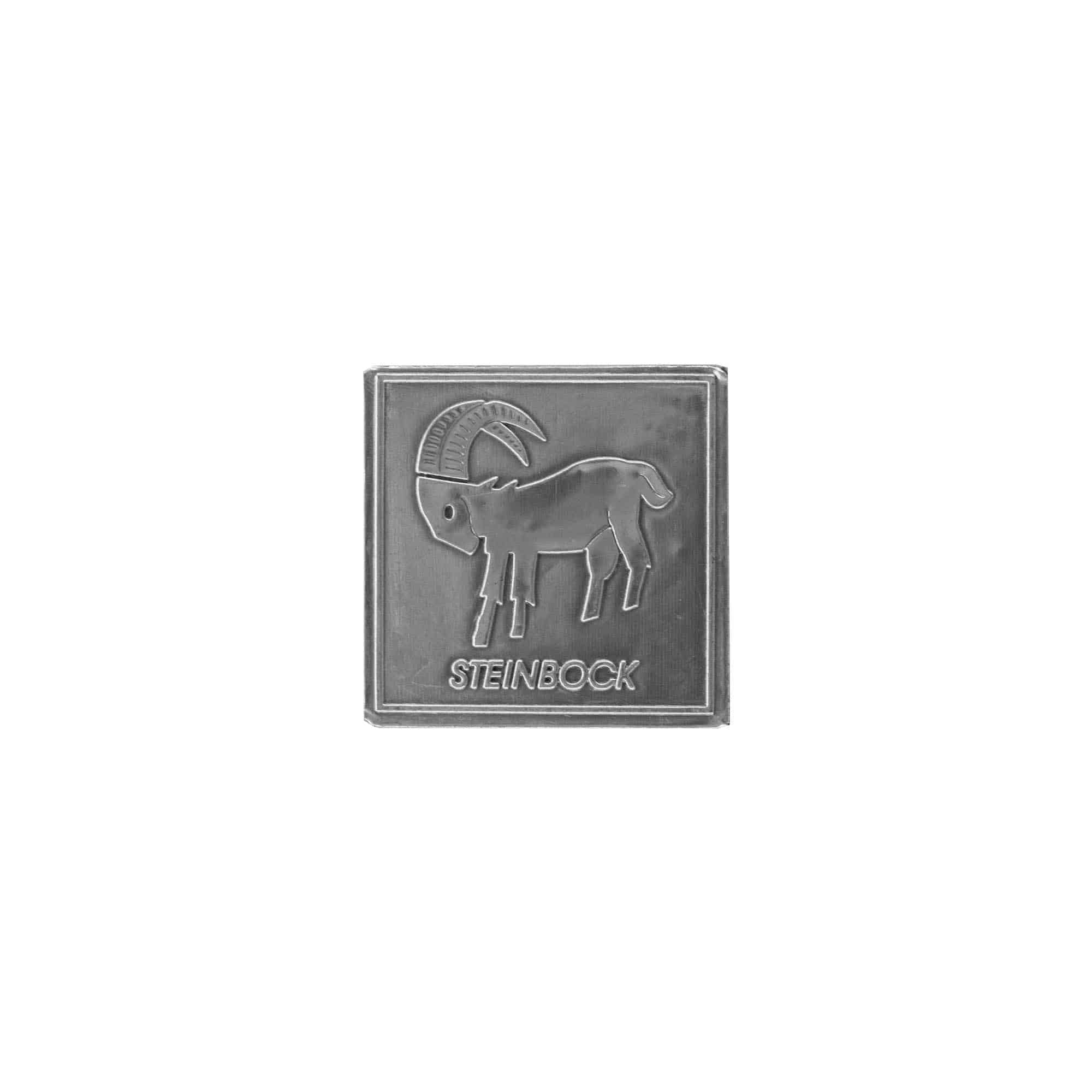 Tennetikett 'Stenbocken', kvadratisk, metall, silver